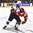 TORONTO, CANADA - JANUARY 2: USA's Tanner Laczynski #10 gets tangled up with Switzerland's Damien Riat #9 during quarterfinal round action at the 2017 IIHF World Junior Championship. (Photo by Matt Zambonin/HHOF-IIHF Images)
